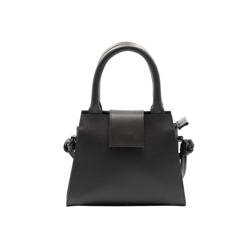 e46d50_505ca3b2f63e48619fe132d8ef7fe8e2mv2.jpg Mini Leather Handbag - Image 1
